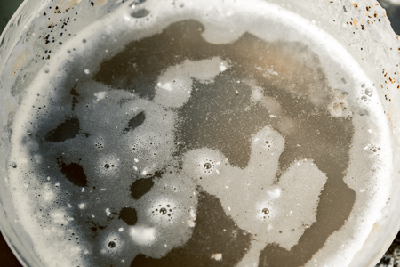 dirty dishes, cups, plates, spoons in the sink. Horizontal frameの写真素材