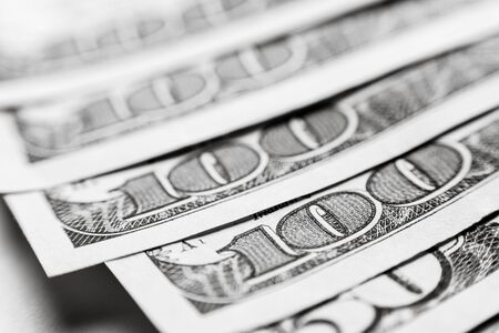 A lot of American money, US dollars, are in the form of a fanの写真素材