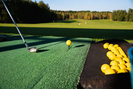 close-up of a club before hitting a golf ballの写真素材