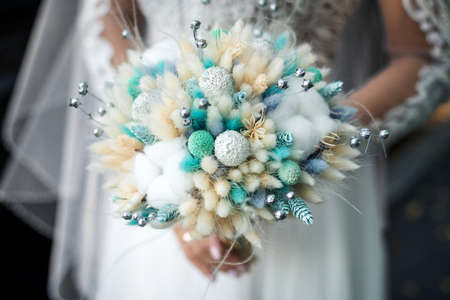 Bride holding her wedding bouquetの写真素材