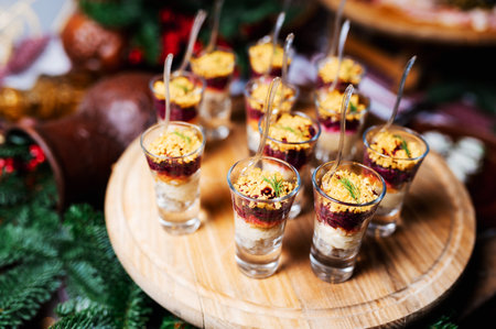 Traditional Russian New Year's salad herring and beet root. Layered vegetables and fish salad....