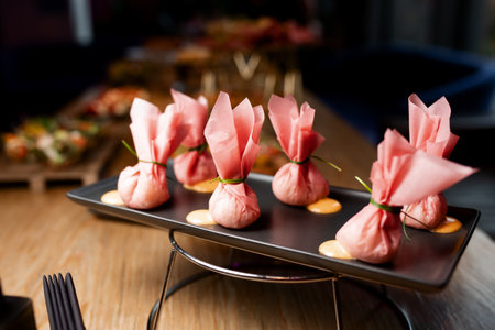 pink wrappers with some foodの写真素材