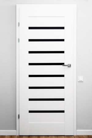 stylish white door with glass linesの写真素材
