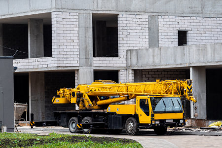 mobile crane on yellow big carの写真素材