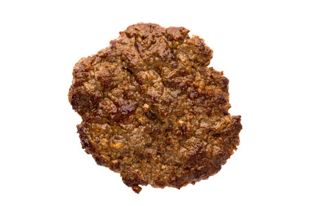Fried cutlet isolated on white background. Fried beef cutlet for burger on white on a close-up.の写真素材