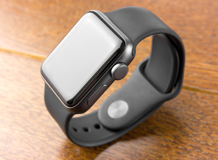February 2018. Apple Watch Series 3 on a wooden table. A new watch from the APPLE company, close-up on a wooden surface.のeditorial素材