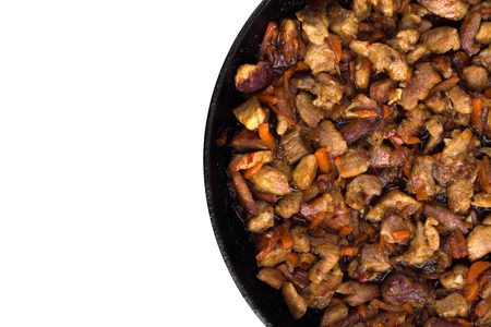 Fried meat in a pan. Fried pieces of pork in a pan cooked for filling noodles.Top viewの写真素材