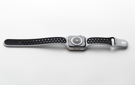 Rostov-on-Don, Russia - December 2018. Apple Watch Nike +
Silver Aluminum Case with Pure Platinum on a white background. New watches from the company APPLE close up on a white background.のeditorial素材