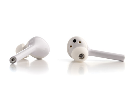 Wireless headphones on a white background. Close-up wireless headset.の写真素材