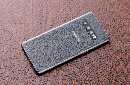 Rostov-on-Don, Russia - March 2019. Samsung Galaxy S10 on a wooden surface.The new Samsung smartphone on a wooden surface.のeditorial素材