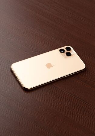 Rostov-on-Don, Russia - october 2019. Apple iPhone 11 Pro on a wooden surface.  New smartphone from...
