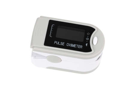 Pulse oximeter on white background Medical diagnostic device for non-invasive measurement of...
