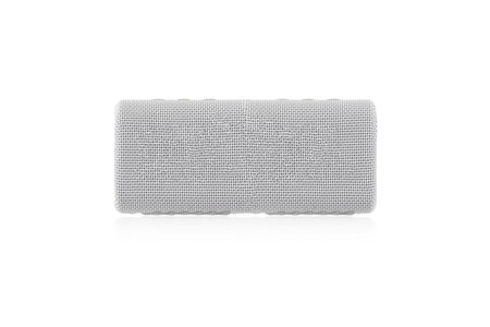 Wireless speaker on a white background. Round music speaker close-up.の写真素材