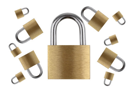 Lock for doors on a white background. Golden color padlock closeup isolated on white background.