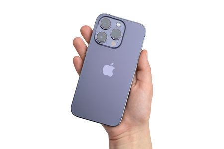 Shenzhen, China - December 2022. iPhone 14 Pro Deep Purple on white background. Smartphone from the...