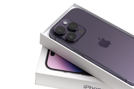 Shenzhen, China - December 2022. iPhone 14 Pro Deep Purple on white background. Smartphone from the company APPLE close-up isolated on a white background.のeditorial素材