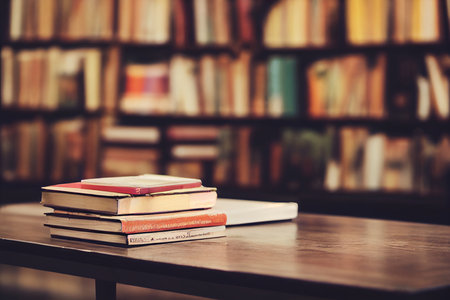 Stack Of Books On Table In Library. Studying in Library.の写真素材
