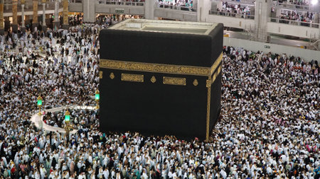 Prayer at Kaaba Masjid Al Haram. Mecca, Saudi Arabia - March 30, 2018.
