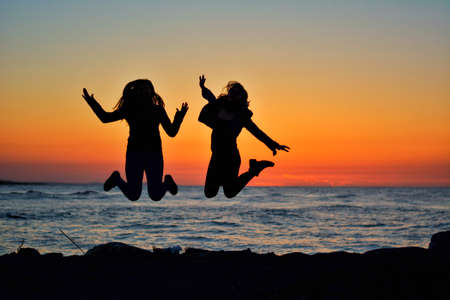 jumping girlsの写真素材