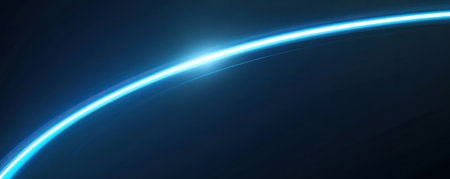 Abstract blue light trail curve on dark background.