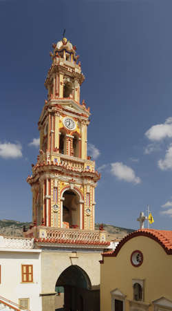 Monastery in Panormitis, Greece, on blue sky background