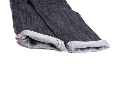 Black jeans with a beautiful embroidery on a pocket and pastes.の写真素材