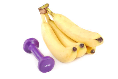 Banana and dumbbells of various colours. To apply in common.の写真素材