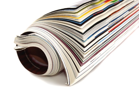 Newspapers and magazines curtailed by a tube. Morning news to reading.の写真素材