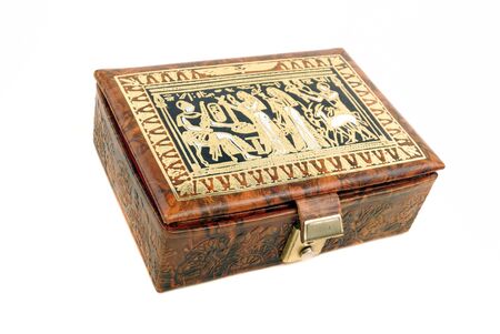 Casket from a skin for storage of ornaments on a white backgroundの写真素材