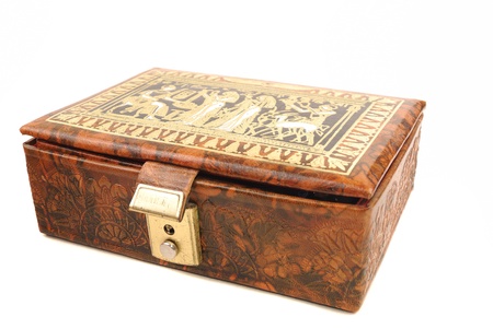 Casket from a skin for storage of ornaments on a white backgroundの写真素材