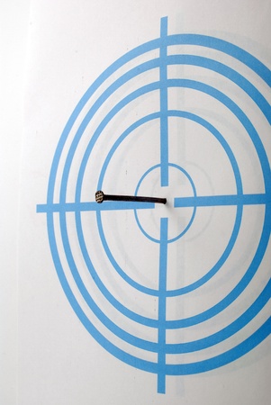 Dark blue target with concentric circles and nailsの写真素材