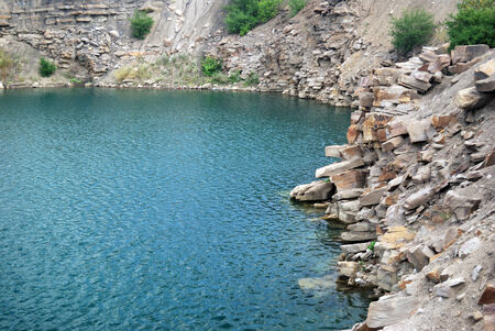 Beautiful rocky beach on a sunny summer dayの写真素材