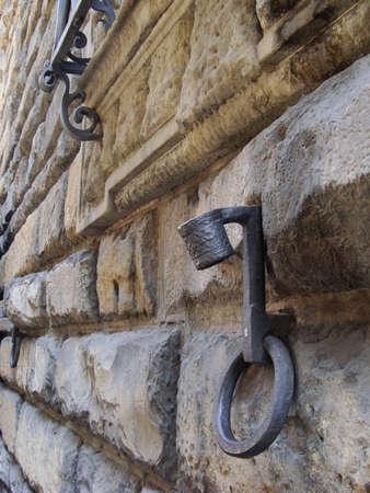 Torch holder on the stone  wall from gothic age in the Florence.の写真素材