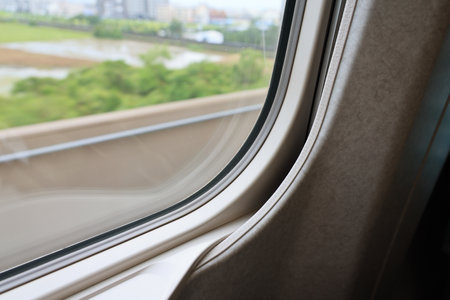 View from the window of a passenger train, close-up.の写真素材