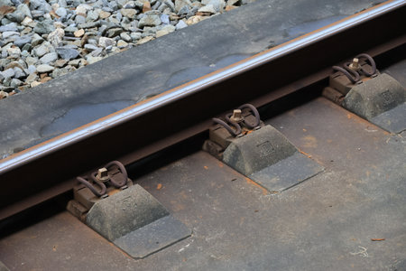Railway rails and sleepers, close-up of photo.