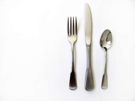 Knife fork and spoon silverware with white backgroundの写真素材