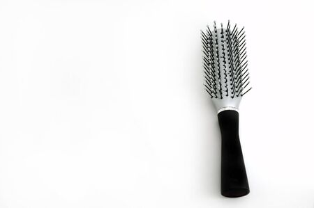 Detail closeup of hair brush isolated on white backgroundの写真素材
