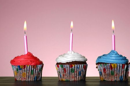 Three cupcakes side by side red white and blueの写真素材