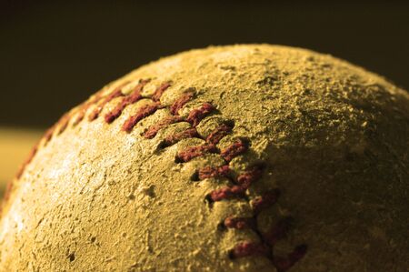 Detail closeup of a worn baseballの写真素材