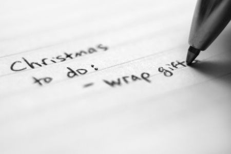 Closeup shot of hand written christmas list of things to do