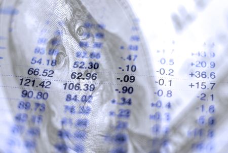 Closeup of hundred dollar bill with stock chart in background showing losses and gains