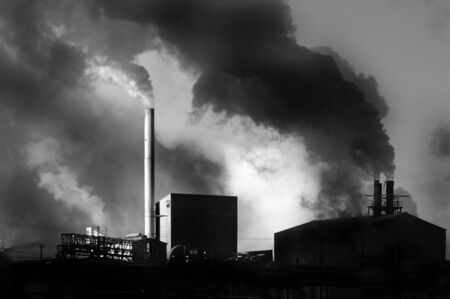 Detail of pollution coming from factory smoke stacksの写真素材