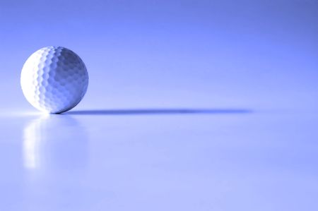 Closeup of golfball with dark shadowsの写真素材