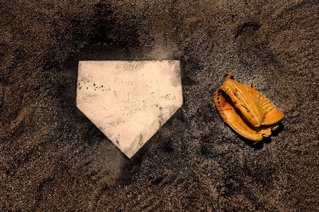 baseball home plate with baseball gloveの写真素材