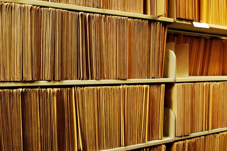 Shelf full of folders and files in an officeの写真素材