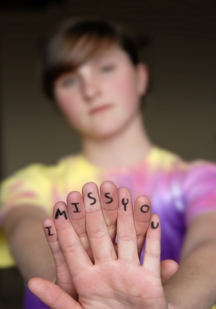 Finger message illustrating relationship with a couple missing each otherの写真素材