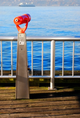 Sight seeing telescope for tourist to view an ocean sceneの写真素材