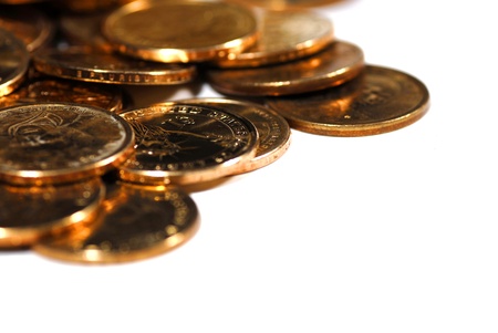 A pile of golden goins representing wealth and savingsの写真素材