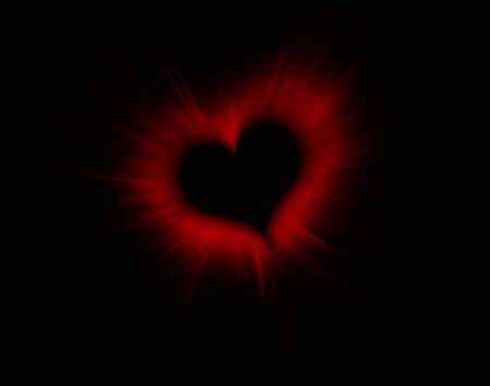 Red Valentine Heart with zoom blur on black backgroundの写真素材