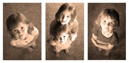 Sequence photographs of little girls looking up at cameraの写真素材